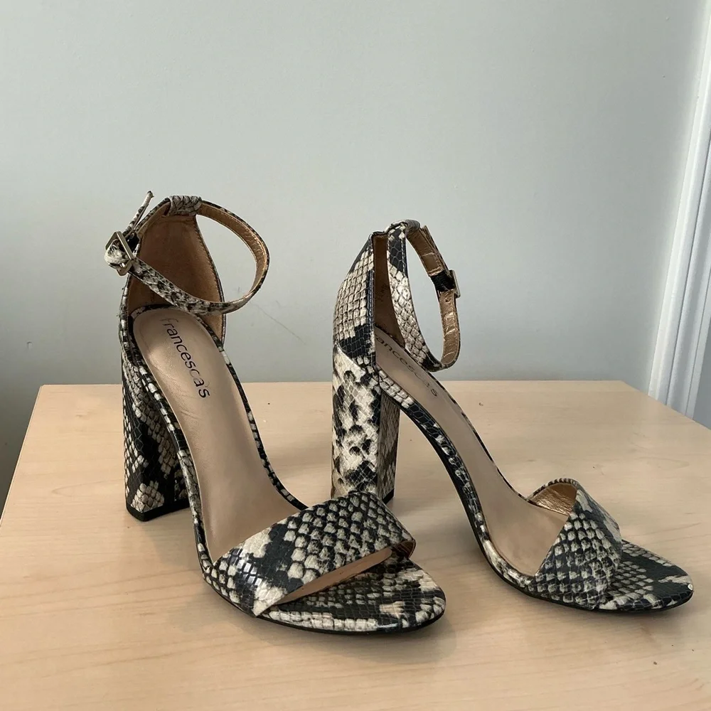 Francesca’s snake print embossed ankle strap heels